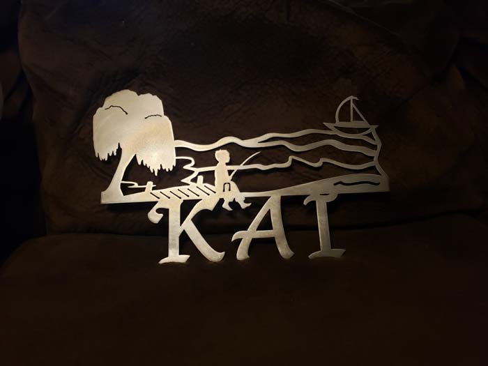 Decorative wood and metal wall shelf with scrollwork and hooks